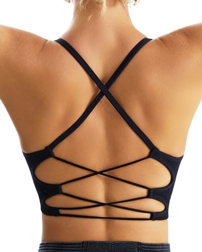 Crisscross back straps and a wide elastic hem anchor this pullover medium support sports bra with removable cup pads.