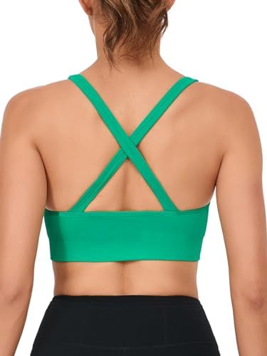 A pullover sports bra with crisscross back straps, removable pads, and a wide elastic underband cut in dark green performance knit.
