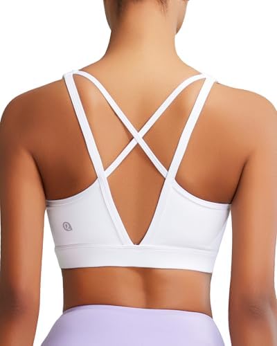 A high support white sports bra built with molded cups, Lycra blend stretch fabric, and a crisscross strappy back.