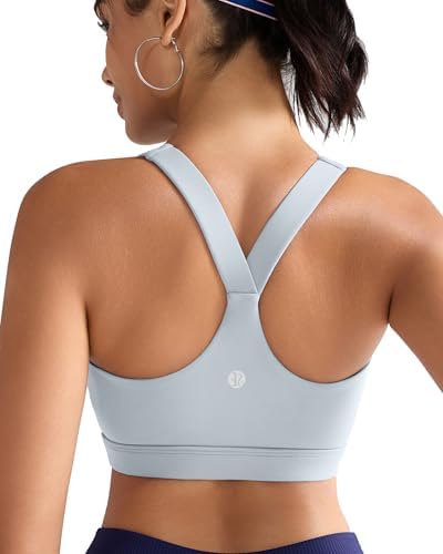 A high impact racerback sports bra built with molded cups, wide elastic straps, and a broad underband in ice grey.