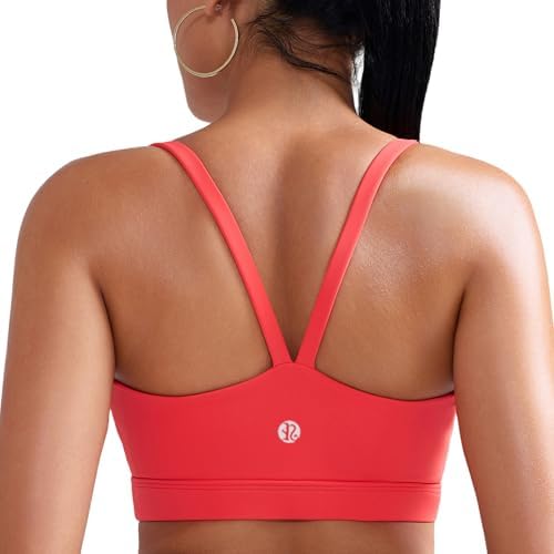 Molded cups and thin V-shaped back straps shape a light pullover bra built for studio practice and low-impact movement.