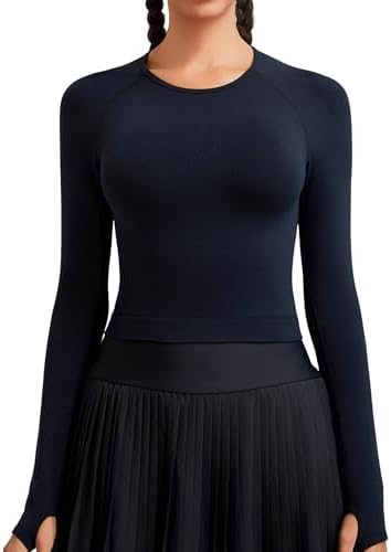 A cropped crewneck long sleeve knit with seamless tubular construction, thumbhole cuffs, and a stay-put curved lower hem.