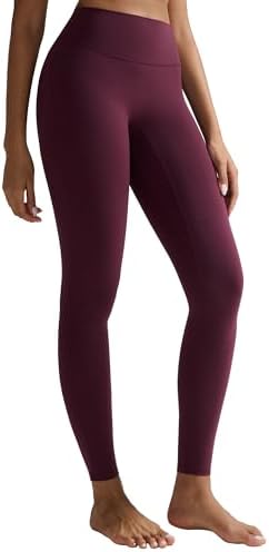 A smooth high-rise legging built without a front rise seam, cut from soft stretch fabric with Lycra for floor work and daily wear.