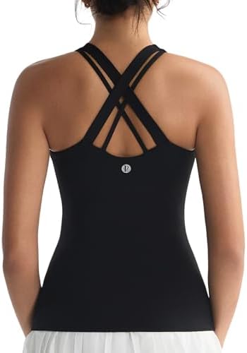 A fitted yoga tank with a built-in shelf bra, asymmetric crisscross straps, and four-way stretch fabric for low-impact work.