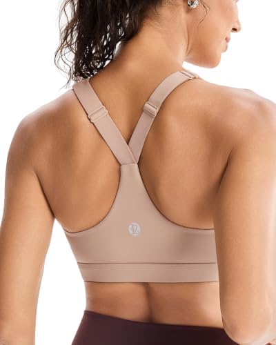 A high impact pullover bra built with adjustable shoulder straps, sewn-in cups, and an open racerback cutout.