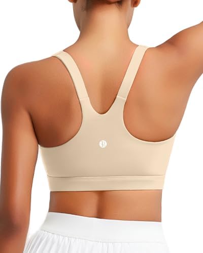 A high impact pullover bra in a neutral sand tone, built with removable molded cups and a wide elastic underband.