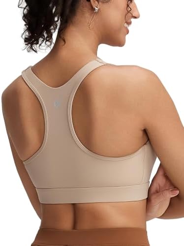 A high impact racerback sports bra built with molded cups and fixed sewn in pads for run training.