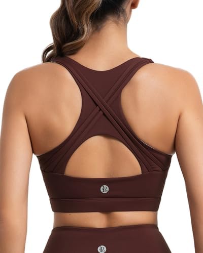 A high-impact pullover bra in rust red with crossed racerback straps, recycled nylon yarn, and removable interior pads.