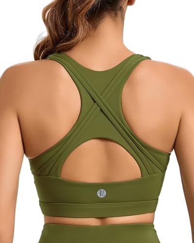 A high impact pullover bra built with recycled nylon yarns, a cutout crossback strap system, and removable pads in olive green.