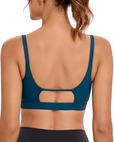 A square-neck longline tank in dark navy blue with double shoulder straps and removable pad pockets.