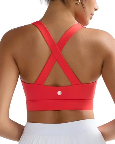 A high impact running bra built with molded cups, full front coverage, and a wide elastic band in deep red.