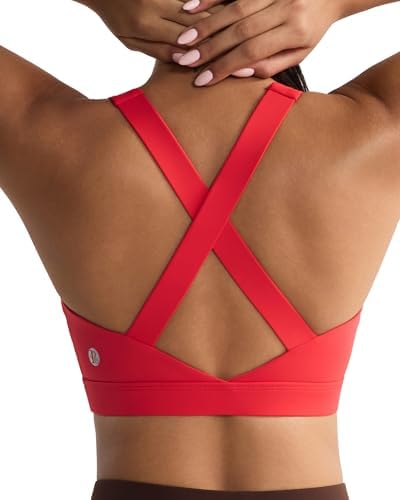 A high impact pullover bra in deep red with sewn in molded cups, wide bottom band, and a crossback strap layout for running.