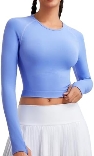 A fitted crew neck layer knit in soft light blue seamless fabric with thumbholes and a curved hem.