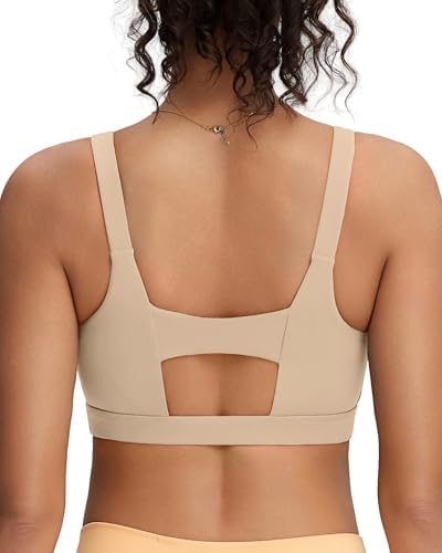 A high impact pullover bra in neutral sand with molded cups, full coverage, and a wide elastic underband built for hard training.