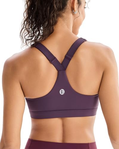 A high-impact pullover bra in deep purple, built with adjustable shoulder straps, sewn-in pads, and a ventilated cutout back.