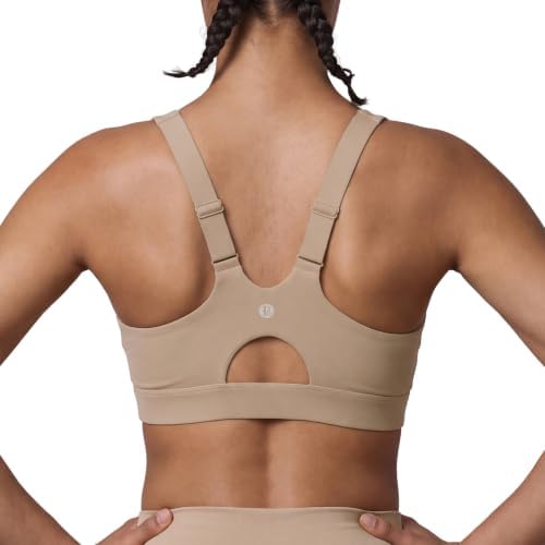 Molded cups and adjustable straps anchor this high impact racerback bra, finished in a quiet neutral nude tone.