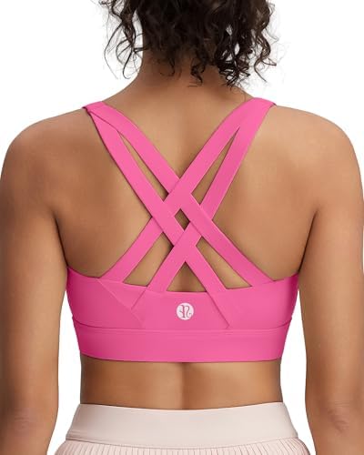 A high-impact pullover sports bra in hot pink, built with molded sewn-in cups and a wide underband for running.