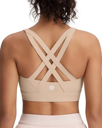 Sewn-in molded cups and a wide elastic underband provide firm support in this pullover high-impact sports bra dyed in neutral beige.