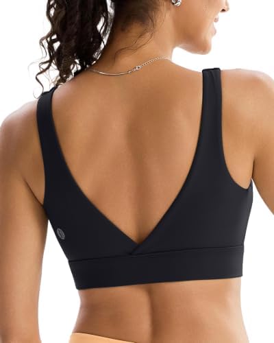 A square neck longline bra in solid black, cut with a low V back, wide straps, and removable padding for light studio work.