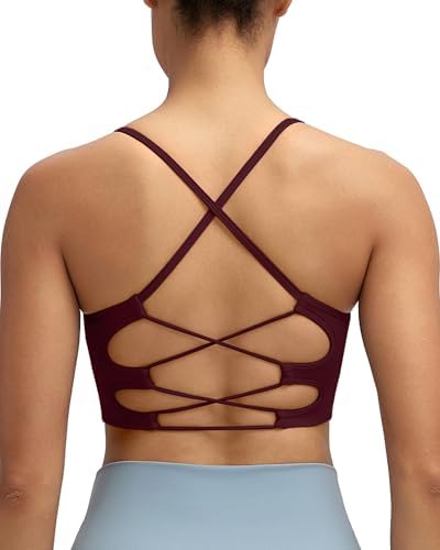 Crisscross straps and a seamless knit build medium support into this wine red studio bra.