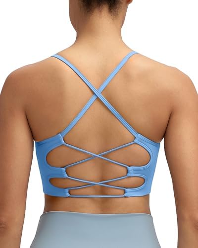 A seamless knit sports bra in clear blue with crisscross back straps, removable cup pads, and a wide underband.