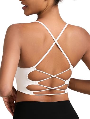 A pullover bra in bright chalk white, built with crisscross back straps, removable pads, and a seamless knit body for medium support.