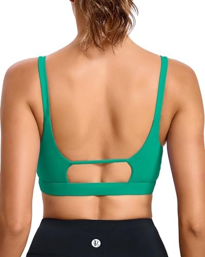 A square neck crop top with paired spaghetti straps, an integrated shelf bra, and removable pads in vivid green.
