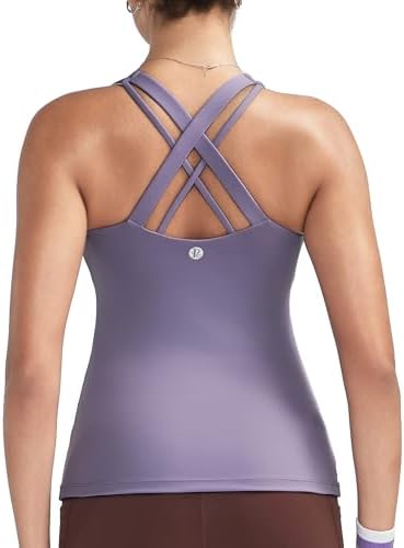 A scoop-neck tank with an integrated shelf bra, twin-width crossback straps, and four-way stretch fabric in deep purple.
