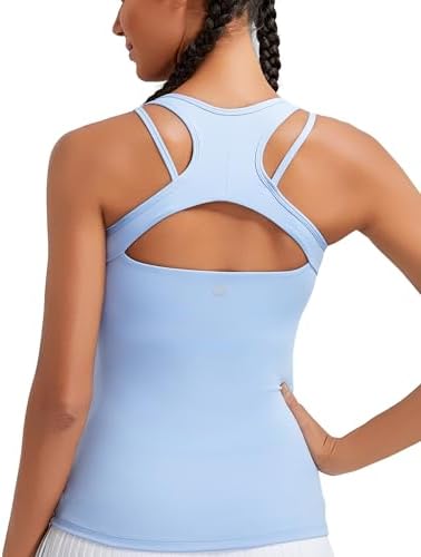 A light support workout tank in clear sky blue, built with an internal shelf bra, removable pads, and a strappy back.